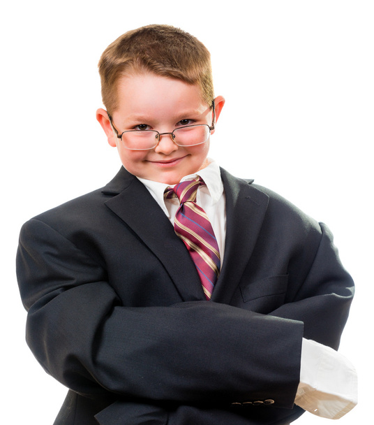 Serious child wearing suit that is too big for him - Фото, изображение