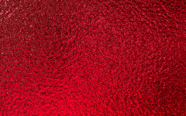 Rot glänzende Folie Metallic-Papier Textur Hintergrund. Einsatz für Weihnachts- und Valentinstag-Konzept. - Foto, Bild