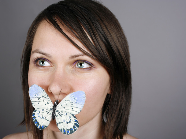 Butterfly on lips - Фото, зображення