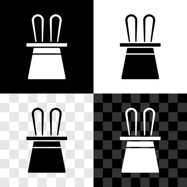 Set Magician hoed en konijnenoren pictogram geïsoleerd op zwart-wit, transparante achtergrond. Magische truc. Mysterie entertainment concept. Vector. - Vector, afbeelding