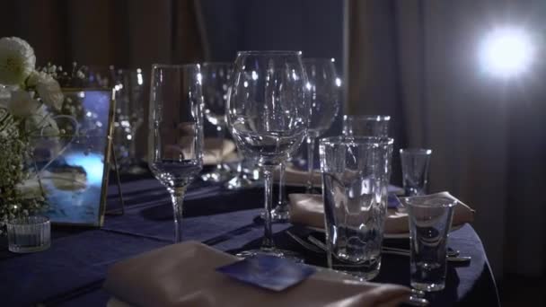 Tables in restaurant ready for dinner, served for party holiday - wedding, birthday or other event - Materiał filmowy, wideo