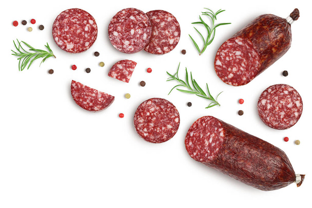 Smoked sausage salami with slices isolated on white background with clipping path. Top view with copy space for your text. Flat lay - Photo, Image