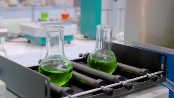 Orbital shaker for mixing, shaking, blending biological samples in glass vials - Footage, Video