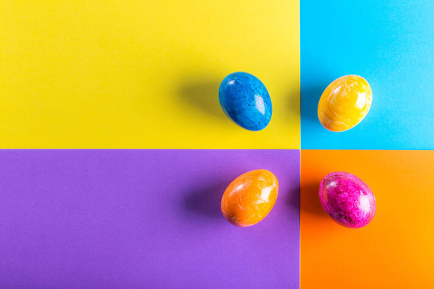 Multicolor geometric background with easter eggs. - Photo, Image