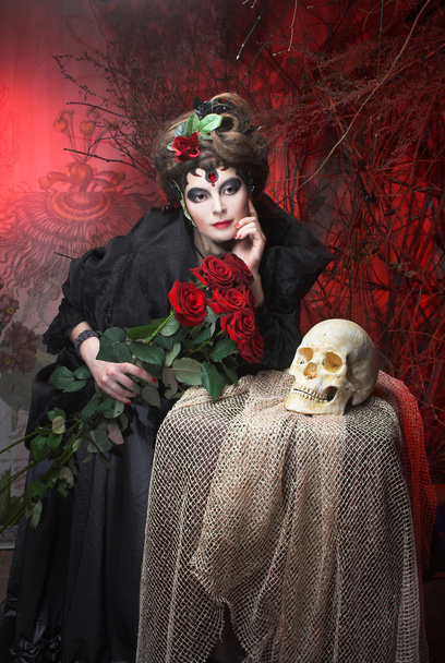 Woman with roses and skull - Фото, изображение