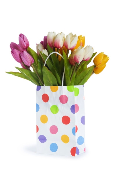 Tulips in shopping bag isolated on white - Photo, Image