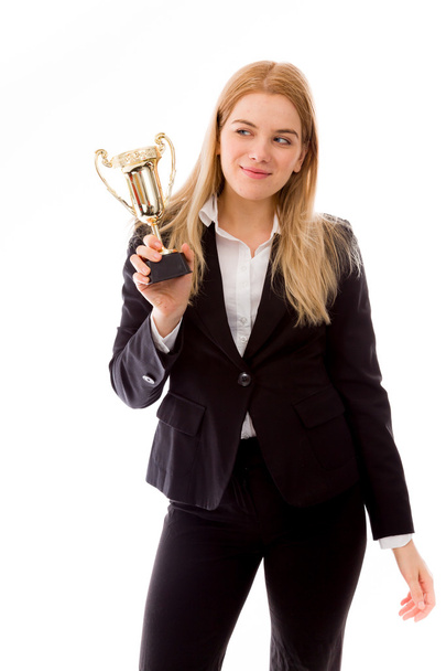 Businesswoman holding trophy - Фото, зображення