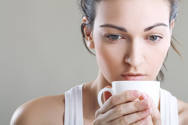 Woman with aromatic coffee in hands - Zdjęcie, obraz