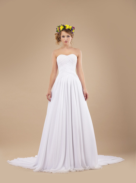 Espousal. Bride Fashion Model with Wreath of Flowers in White Dress - Фото, изображение