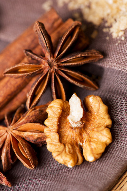 Star anise, walnut, brown sugar with - Foto, imagen