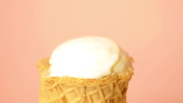Close up ice cream in waffle cone melting fast. Heating frozen product - Footage, Video