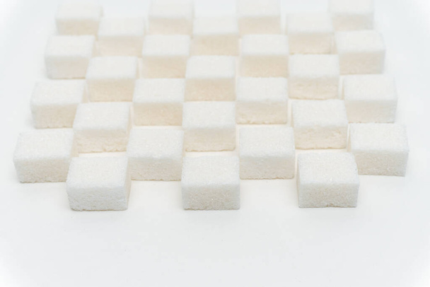 cubos de açúcar ingrediente doce escalonado glicose fundo leve - Foto, Imagem