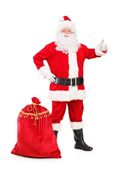 Felice Babbo Natale dando pollice in su
 - Foto, immagini