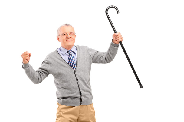 Senior man holding cane - 写真・画像