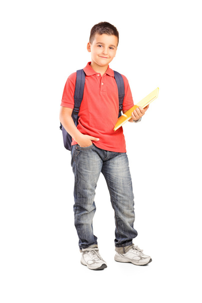 Schoolboy with backpack holding a note - Fotografie, Obrázek