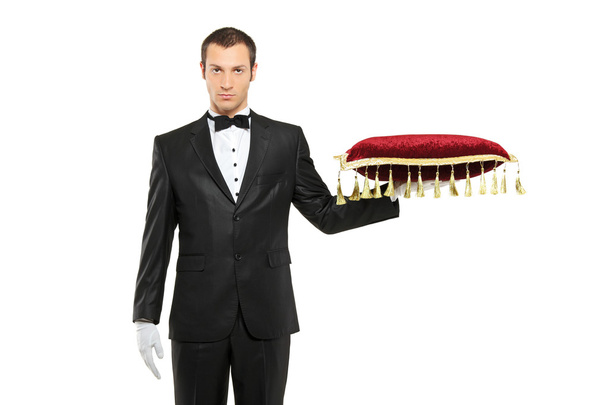 Man in suit holding pillow - Photo, image