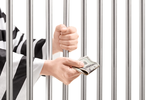 Man in jail giving bribe - Foto, immagini