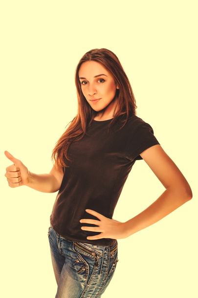 Happy young woman girl shows positive sign thumbs yes, in gray T - Foto, Imagem