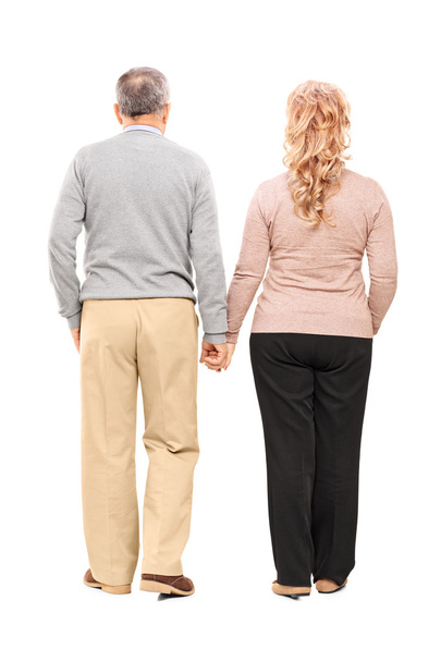 Middle aged couple holding hands - Photo, Image
