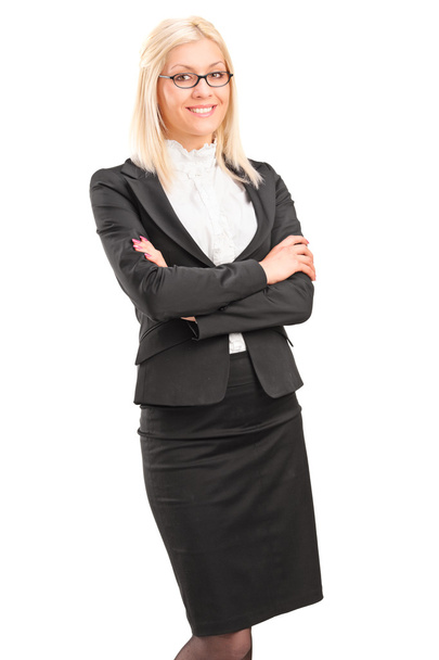 Smiling young businesswoman standing - Fotó, kép