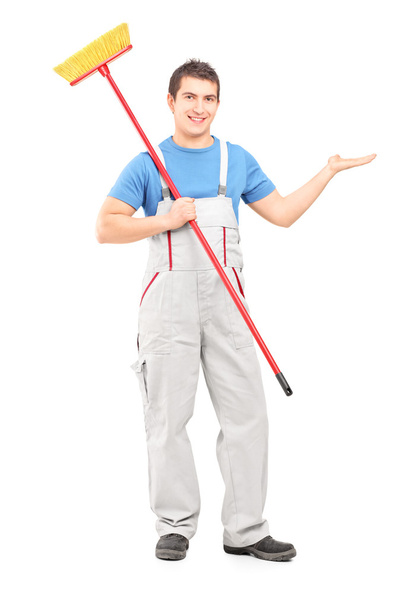 Cleaner with broom pointing - Φωτογραφία, εικόνα