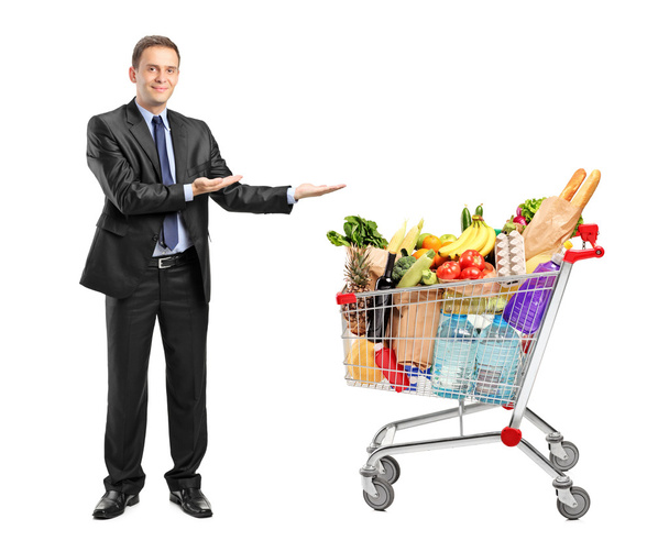 Man and shopping cart - Foto, imagen