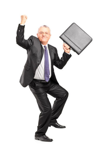 Businessperson with raised hands - Фото, зображення
