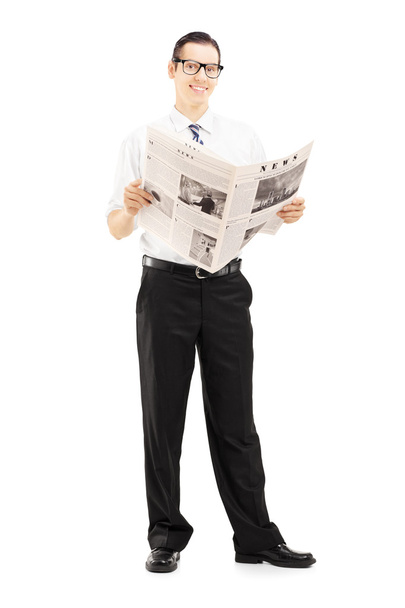 Businessperson reading newspaper - Фото, зображення
