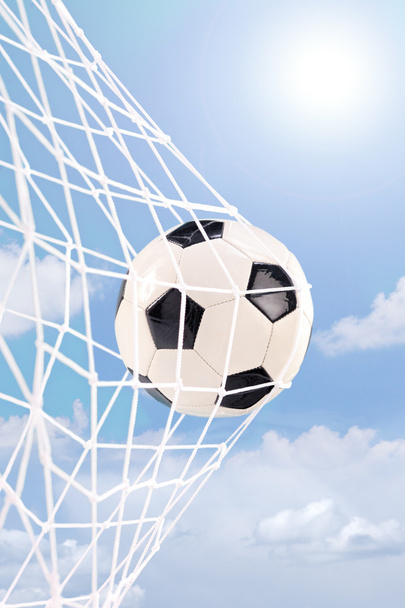 Soccer ball in a net - Fotografie, Obrázek