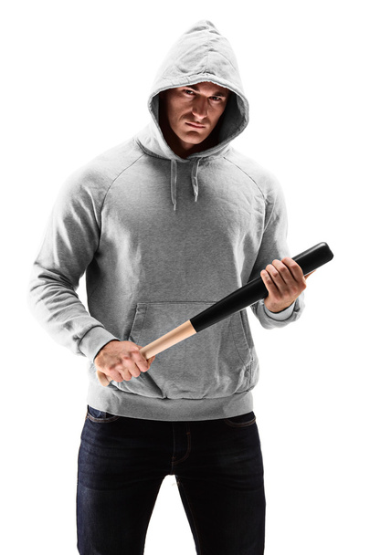 Man olding a baseball bat symbolizing crime - Photo, image