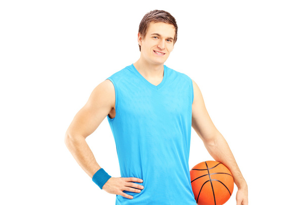 Basketball player holding ball - Photo, Image