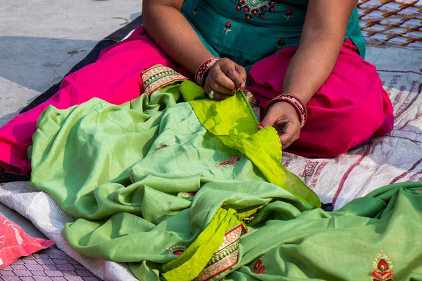 Ladies tailor sewing cloth handmade - Photo, Image