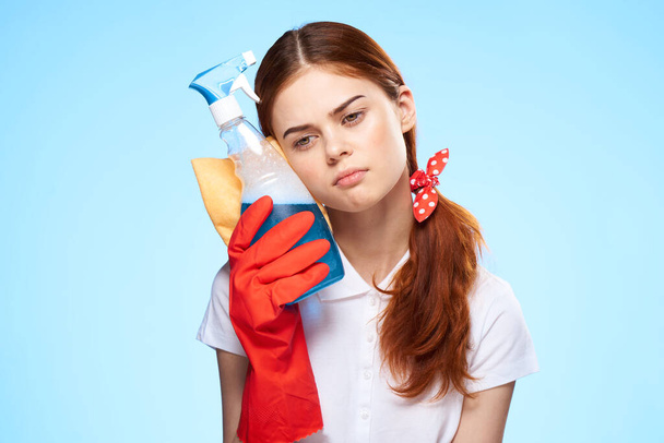 professional cleaning lady home care blue background - Foto, afbeelding