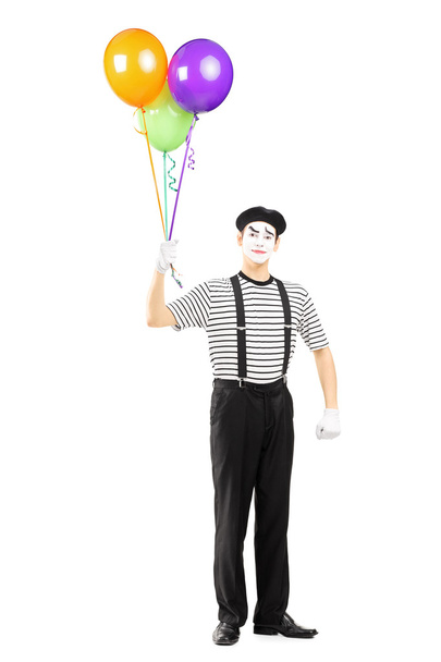 Mime artist holding balloons - Fotoğraf, Görsel