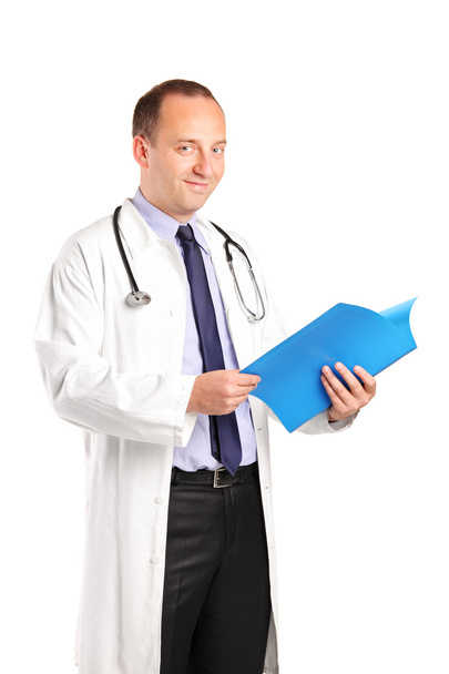 Medical doctor holding medical file - Foto, Bild