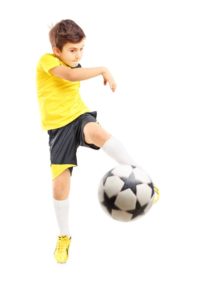 Kid shooting soccer ball - Photo, Image