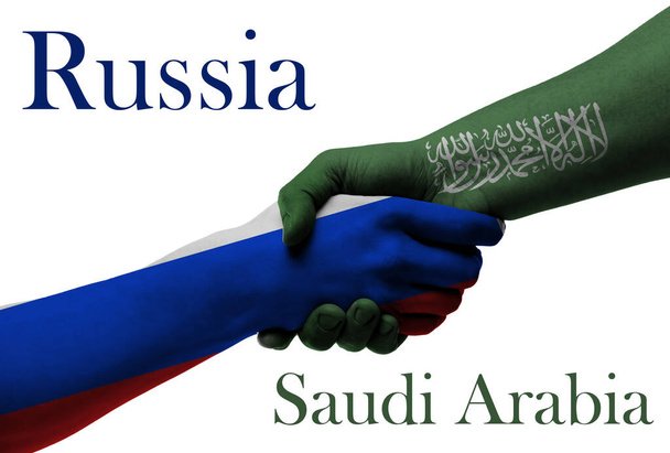 Oroszország és Szaúd-Arábia - Az együttműködést és a barátságot szimbolizáló zászlókezek - Fotó, kép