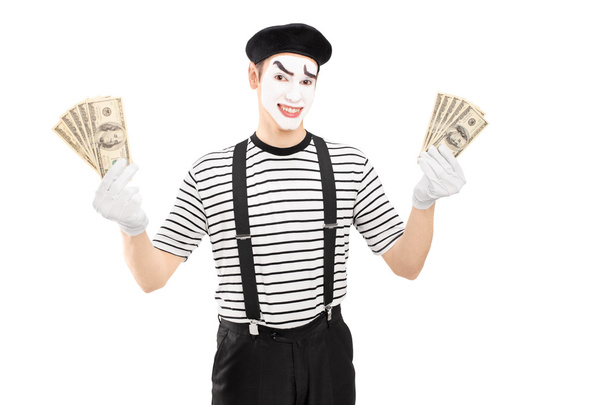 Mime artist holding US dollars - Фото, зображення