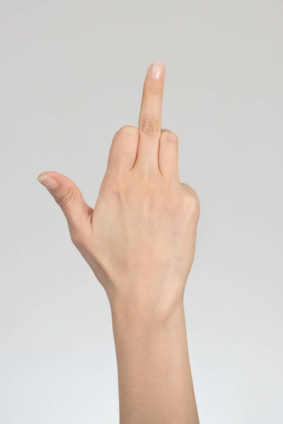 Middle finger gesture isolated on white background. - Photo, Image