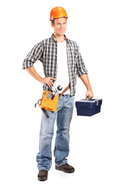 Worker holding wrench and toolbox - Foto, afbeelding