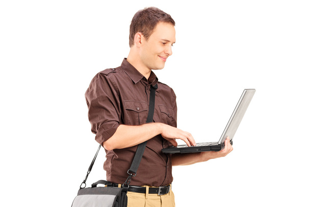 Young man working on laptop - Foto, Imagem