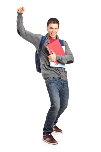 Happy student holding books - Foto, immagini