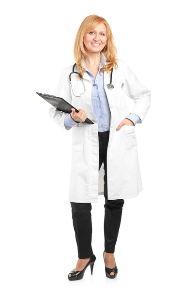 Mature healthcare professional with clipboard - Фото, зображення