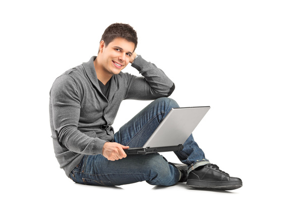 Male with laptop - Foto, afbeelding
