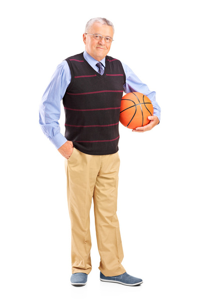 Gentleman holding basketball - Фото, зображення