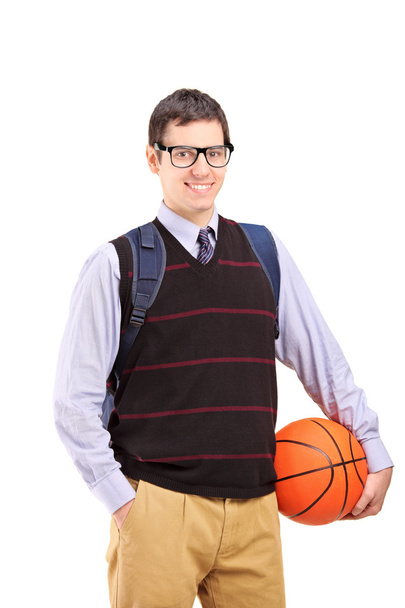 Male student holding basketball - Фото, зображення