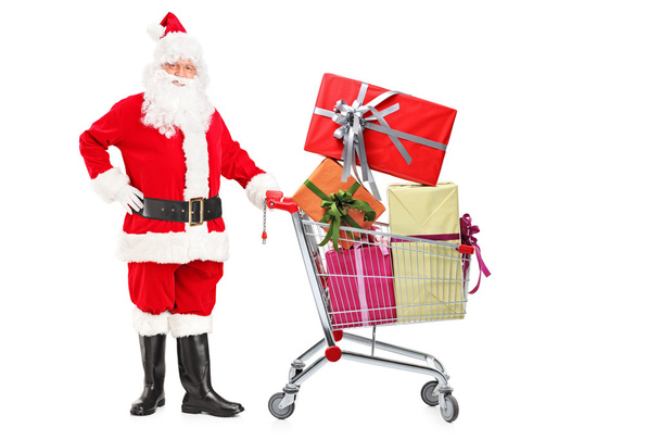 Papai Noel empurrando carrinho de compras
 - Foto, Imagem