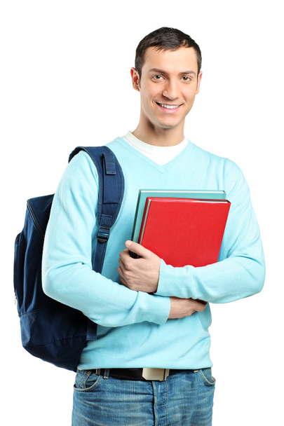 Male student holding books - Foto, afbeelding