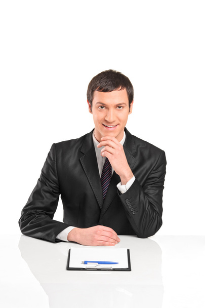 Businessman sitting during interview - Фото, изображение