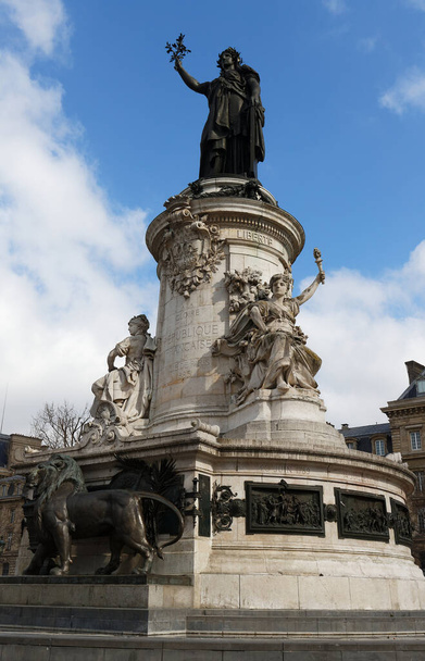 View of the Republique Statue in Republic square in Paris, France. At the top of this monument stands a female figure which is the personification of France. - Photo, Image